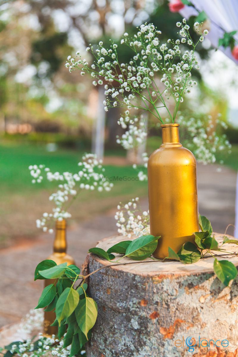 Photo of Flowers in brass vases