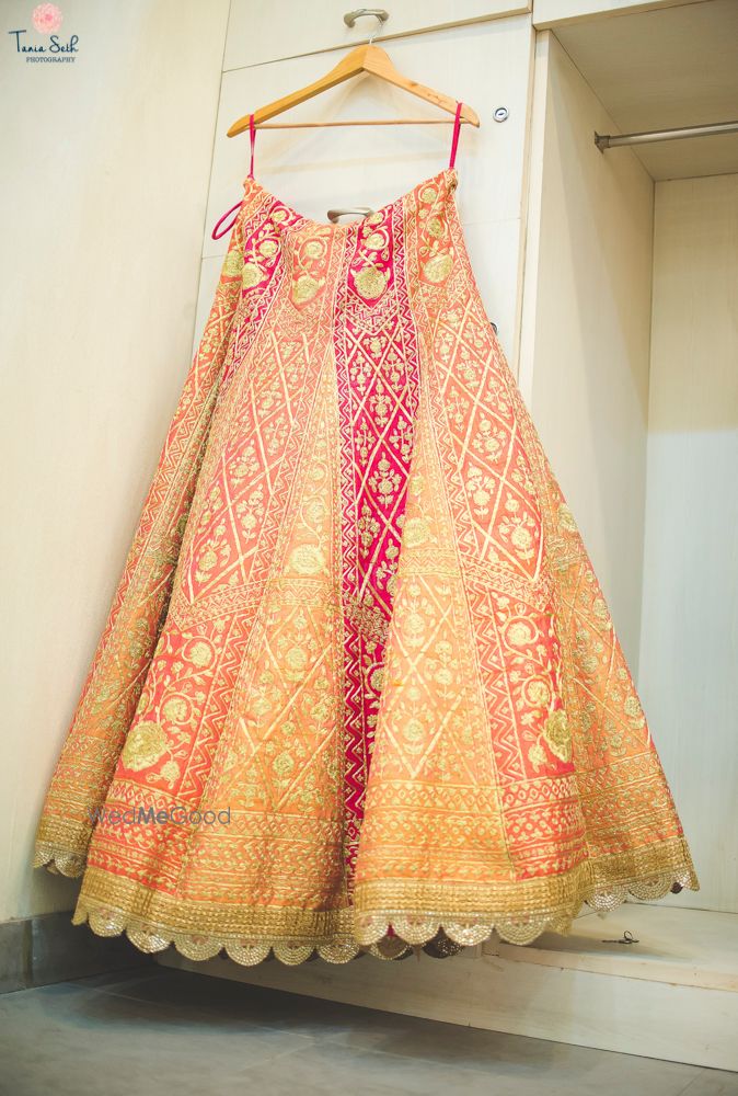 Photo of Shaded ombre lehenga in peach and coral