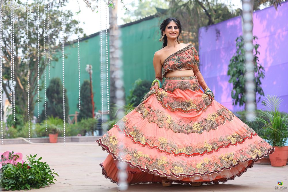 Photo of Summery peach lehenga with off shoulder blouse