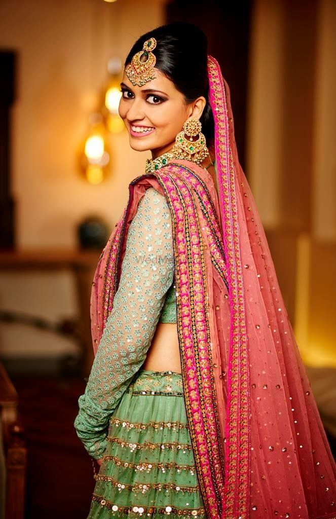 Photo of Unique green and bridal lehenga with red dupatta