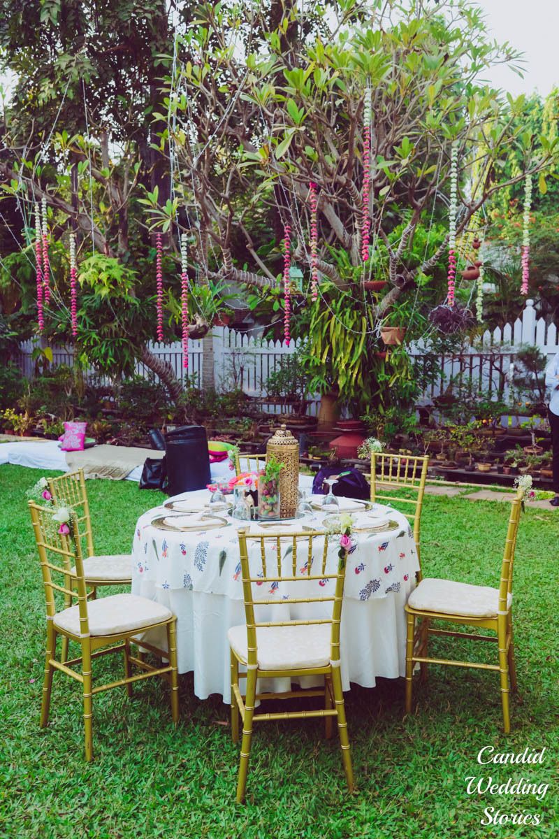 Photo of Elegant white and gold theme outdoor setting