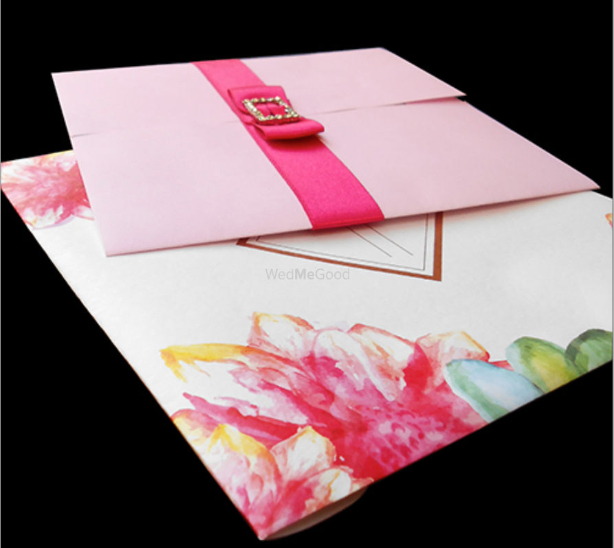 Photo of light pink invitations