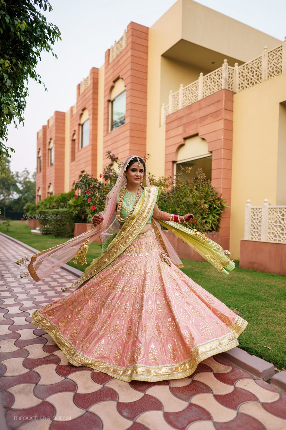 Photo of Peach and light green offbeat bridal lehenga