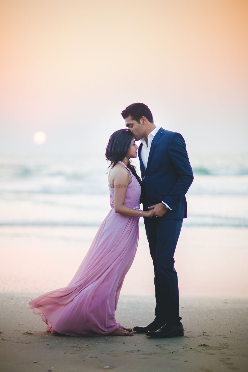 Photo of Sunset pre wedding shoot on beach