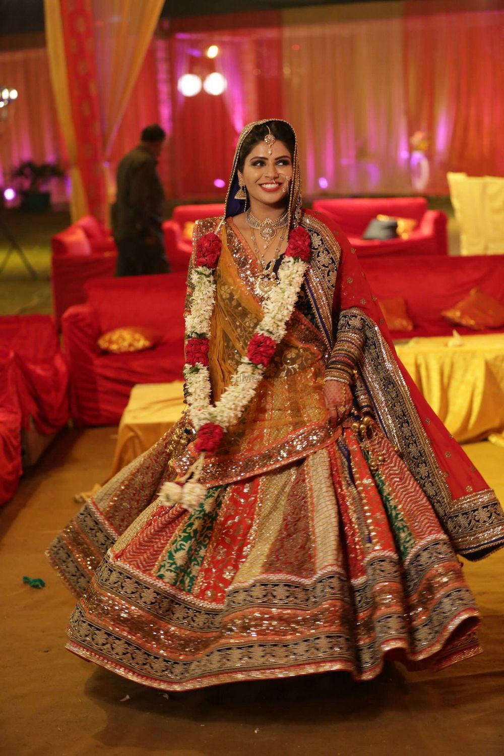 Photo of multi colored bridal lehenga