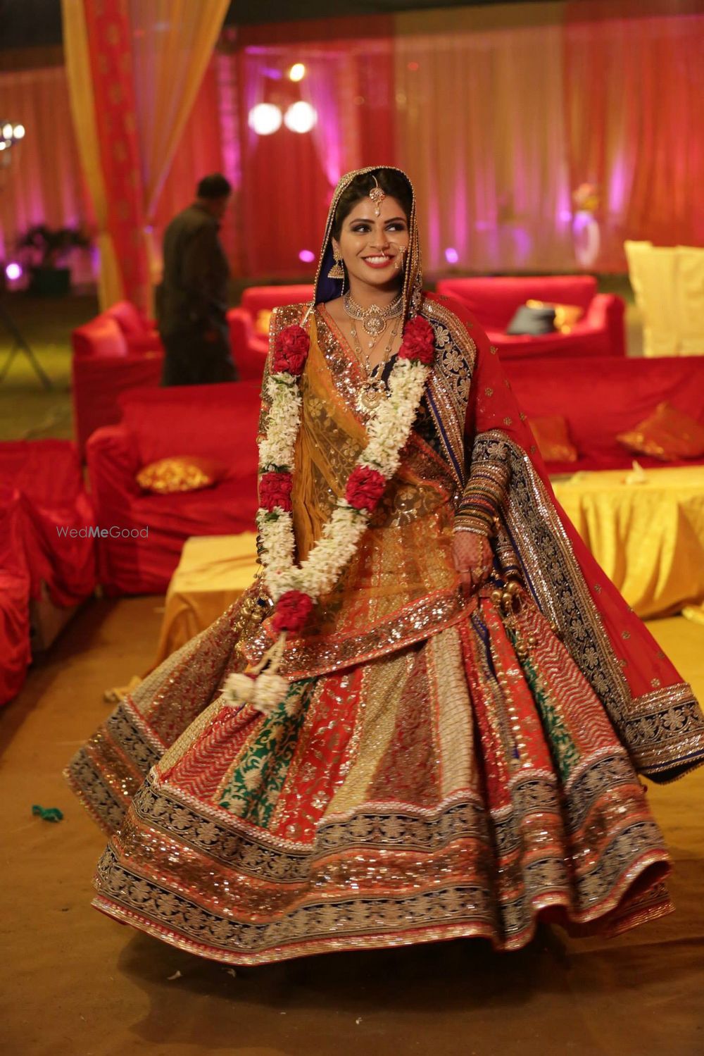 Photo of multi colored bridal lehenga