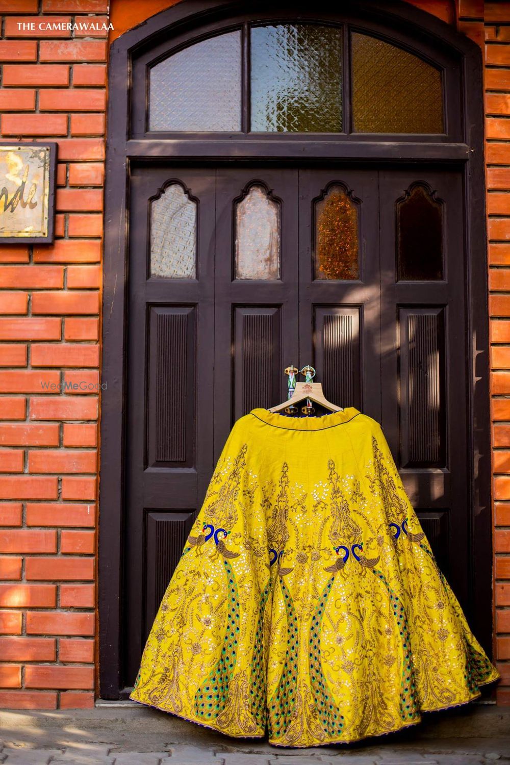 Photo of Hanging lehenga shot in yellow