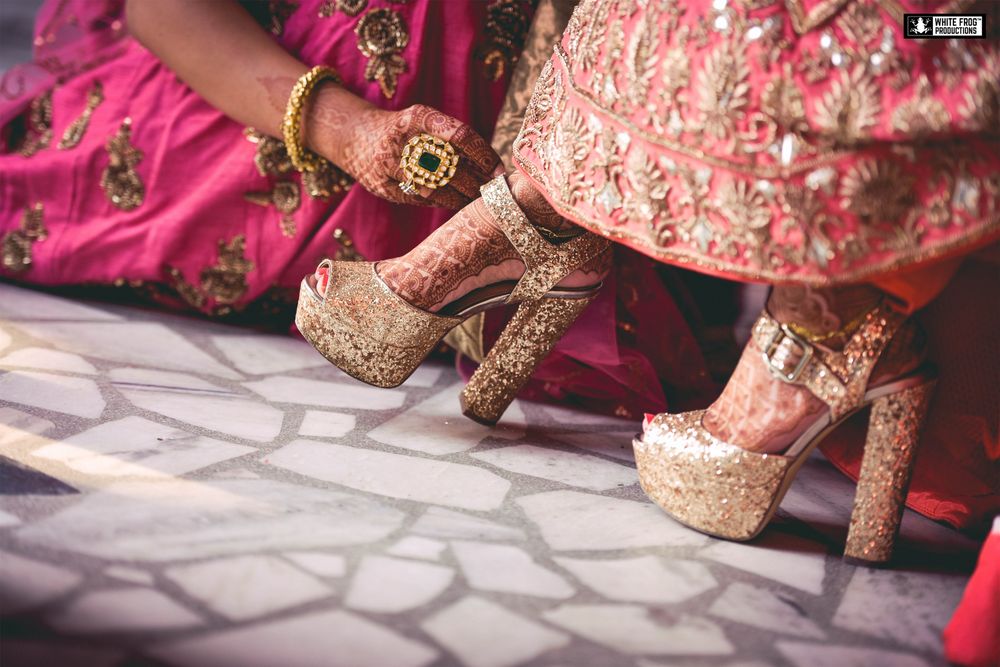 Photo of Gold glittery bridal heels with block heels