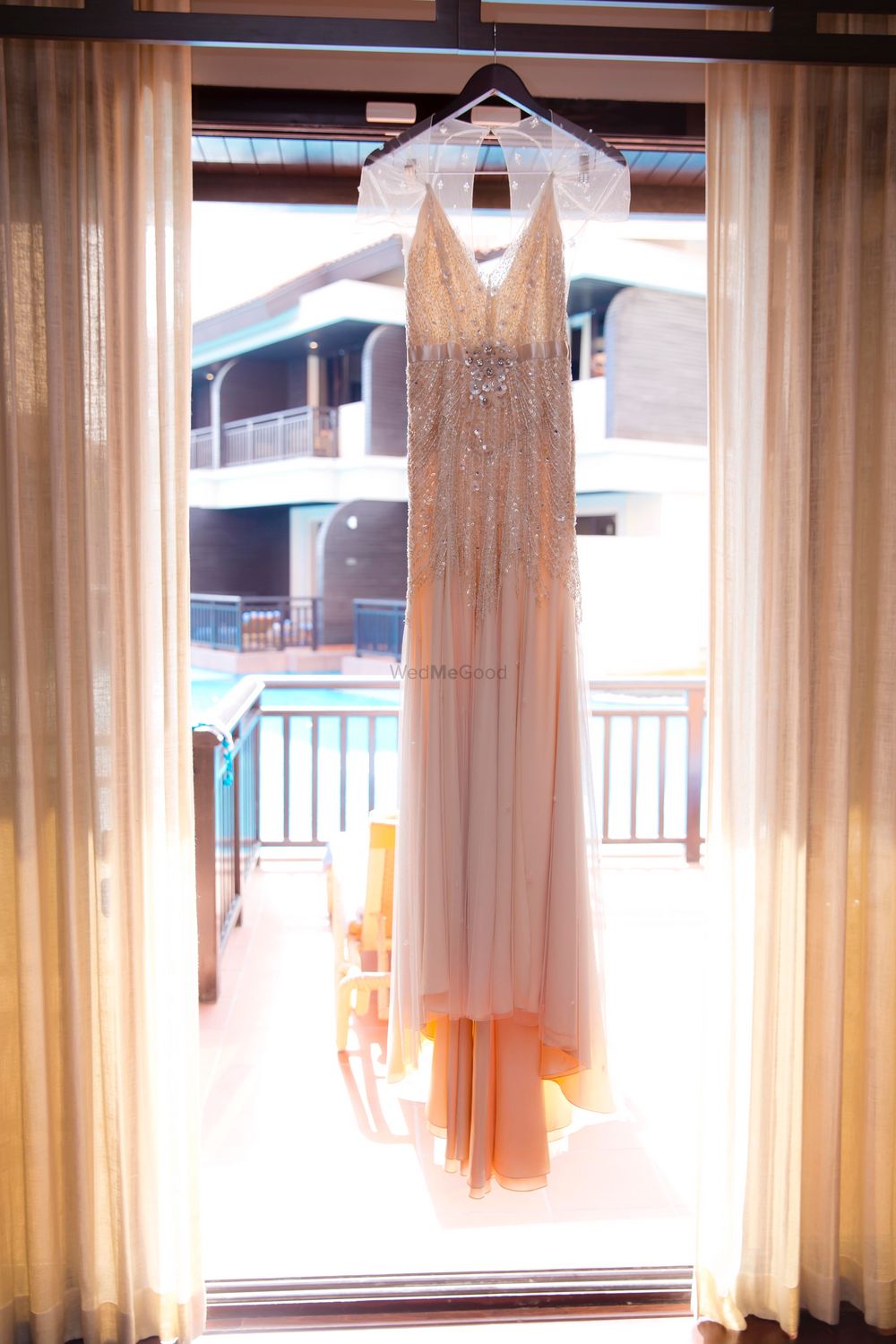 Photo of blush colored wedding gown