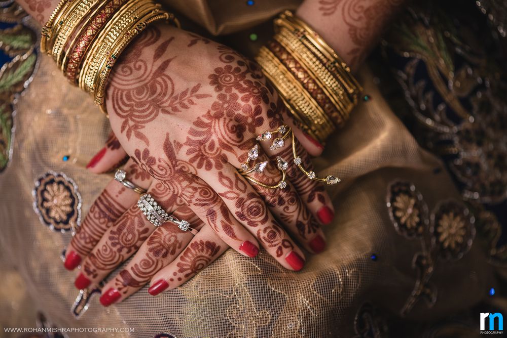 Photo of Bridal hands with unique engagement jewellery