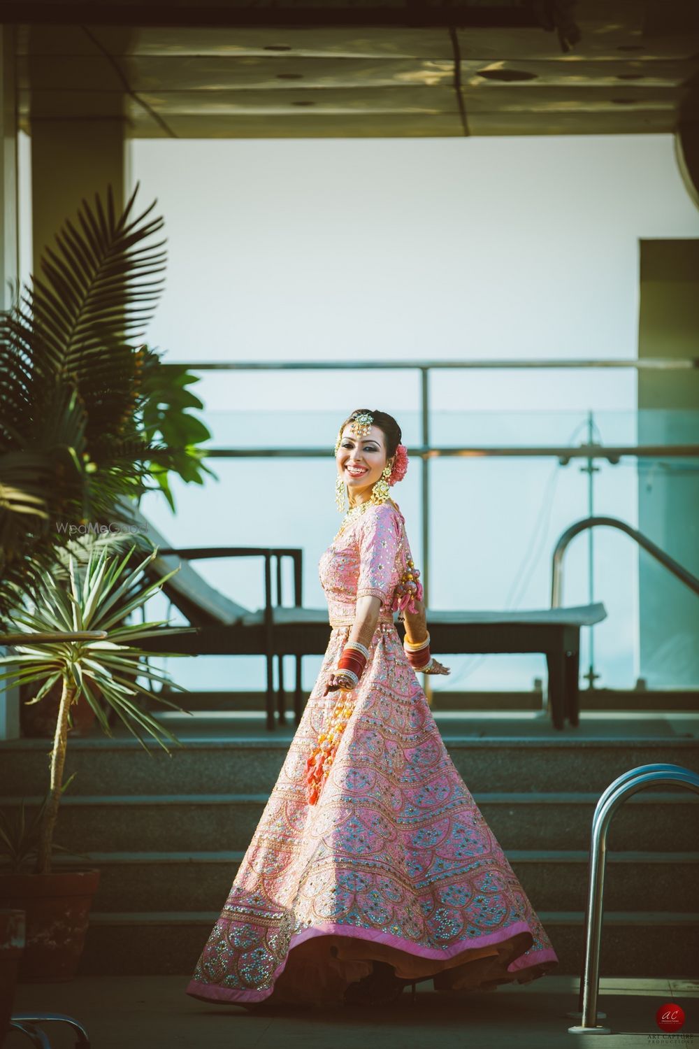 Photo of Happy bride twirling shot