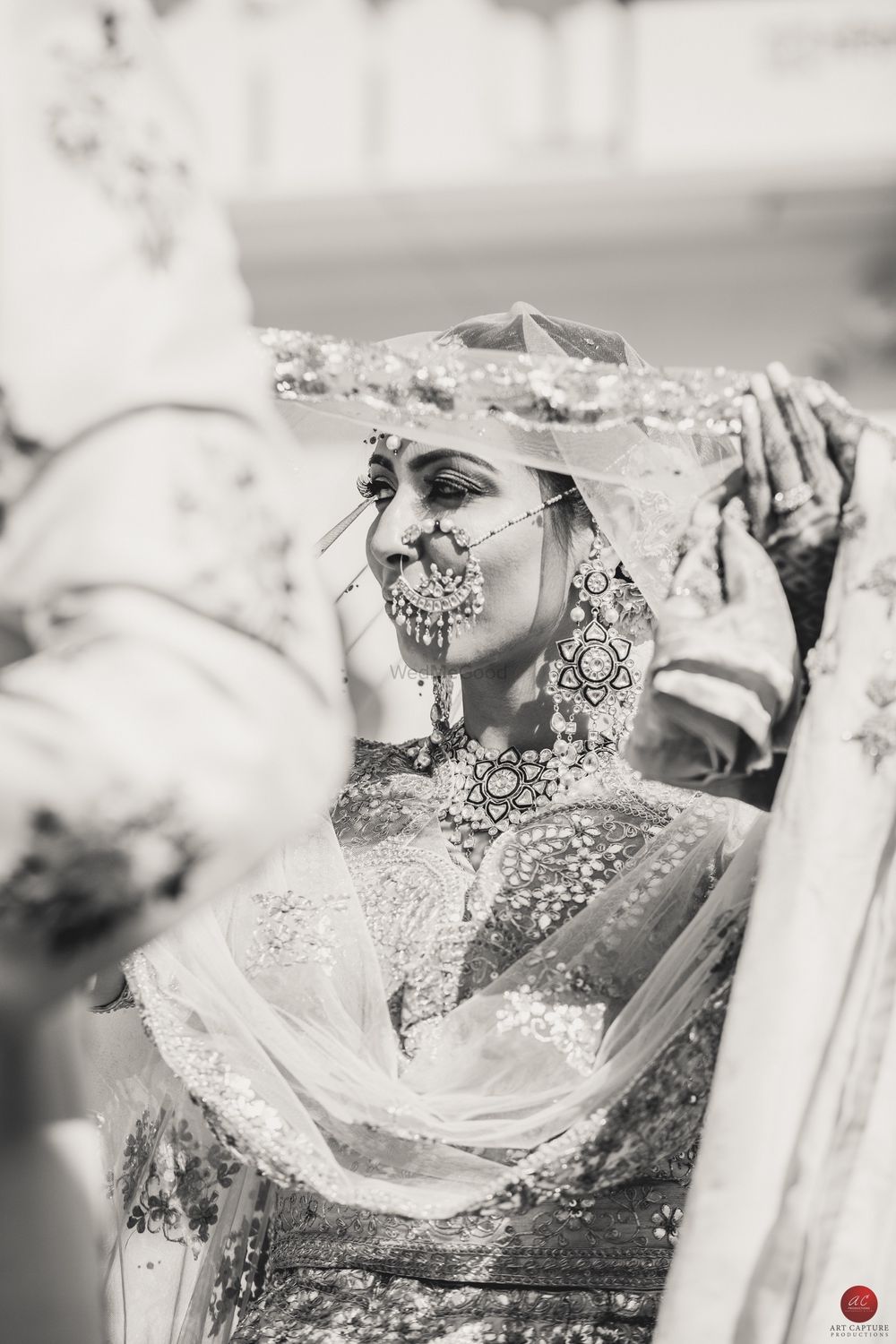 Photo of Black and white bridal portrait of bride wearing vintage Nath