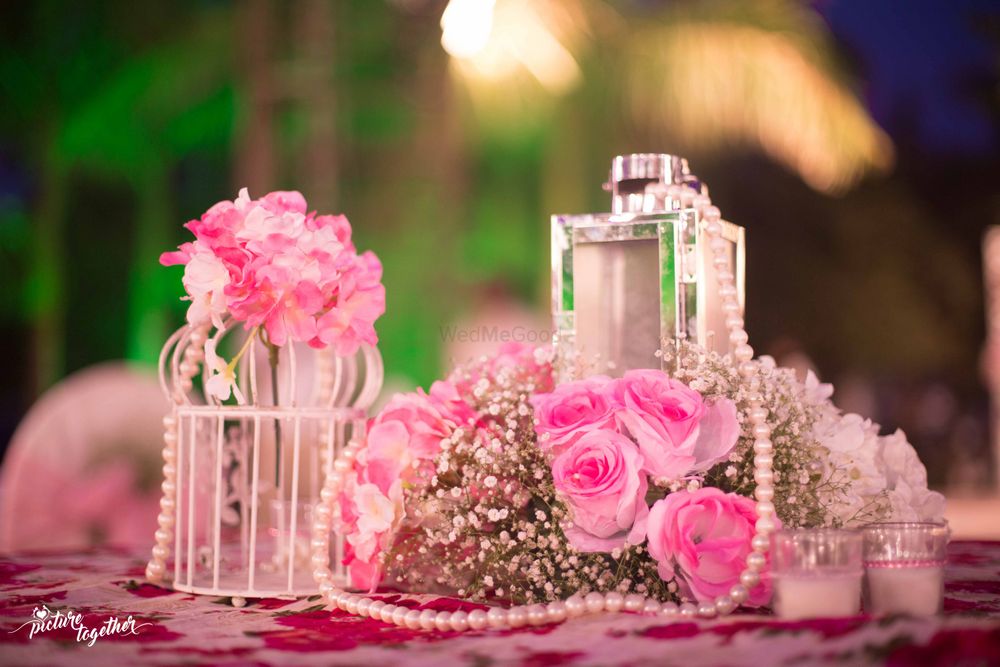 Photo of pretty table decor in pink and white