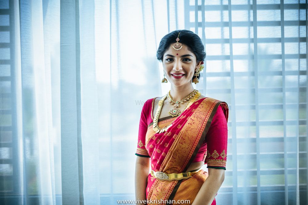 Photo of Red and green bridal Kanjeevaram saree