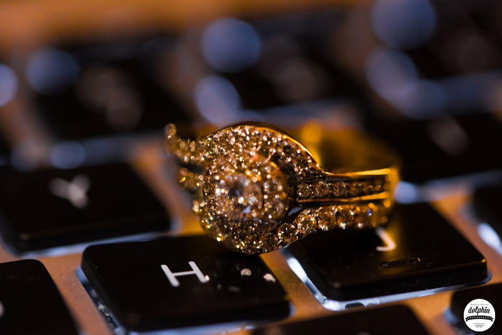 Photo of Engagement ring photography idea on a keyboard