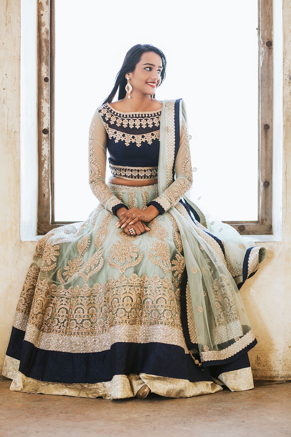 Photo of Black mint and gold lehenga for sister of the bride