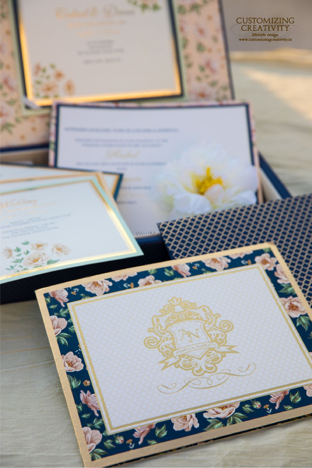 Photo of Wedding invites with floral print borders