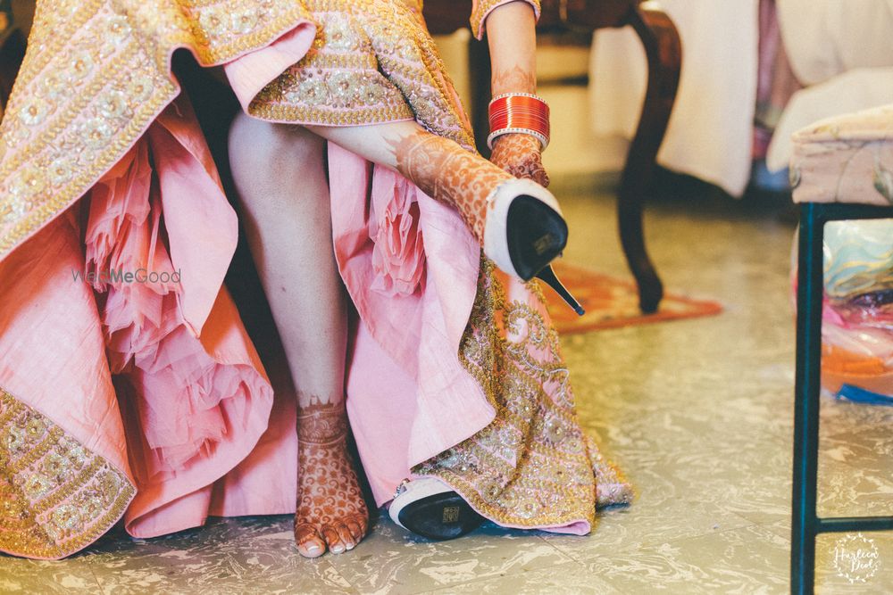 Photo of Lehenga with can can and bride wearing shoes