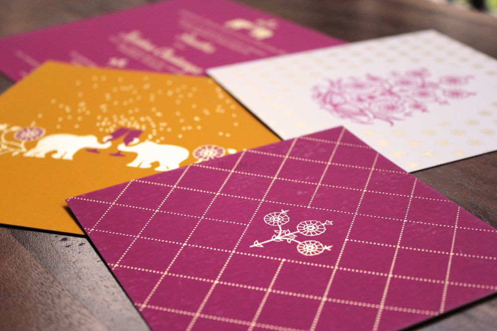 Photo of purple wedding cards
