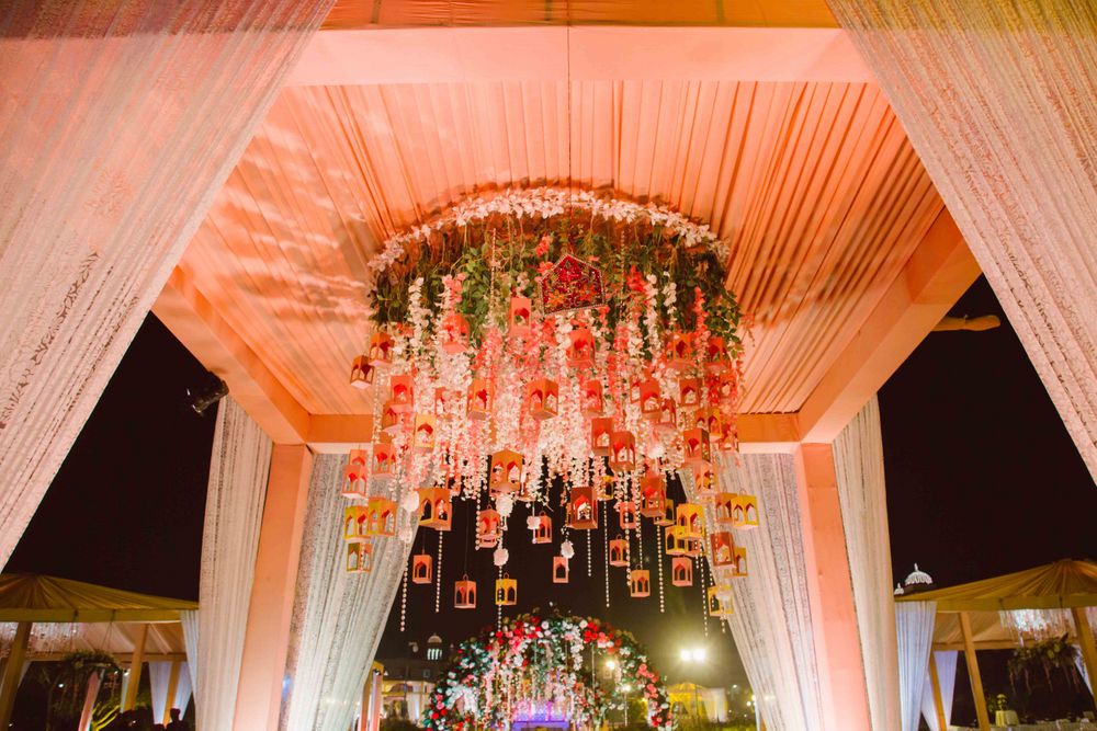 Photo of Peach wedding decor with hanging floral strings