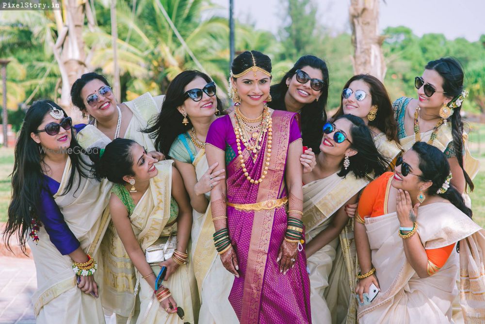 Photo of Fun bride and bridesmaids shot