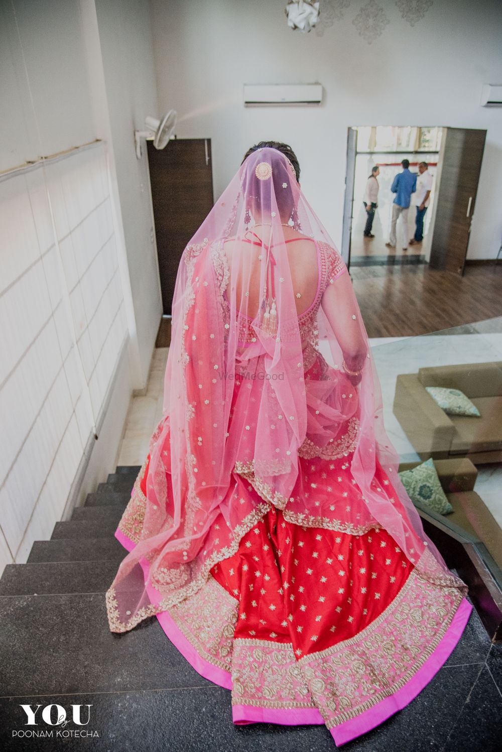 Photo of Red bridal lehenga with pink dupatta and border
