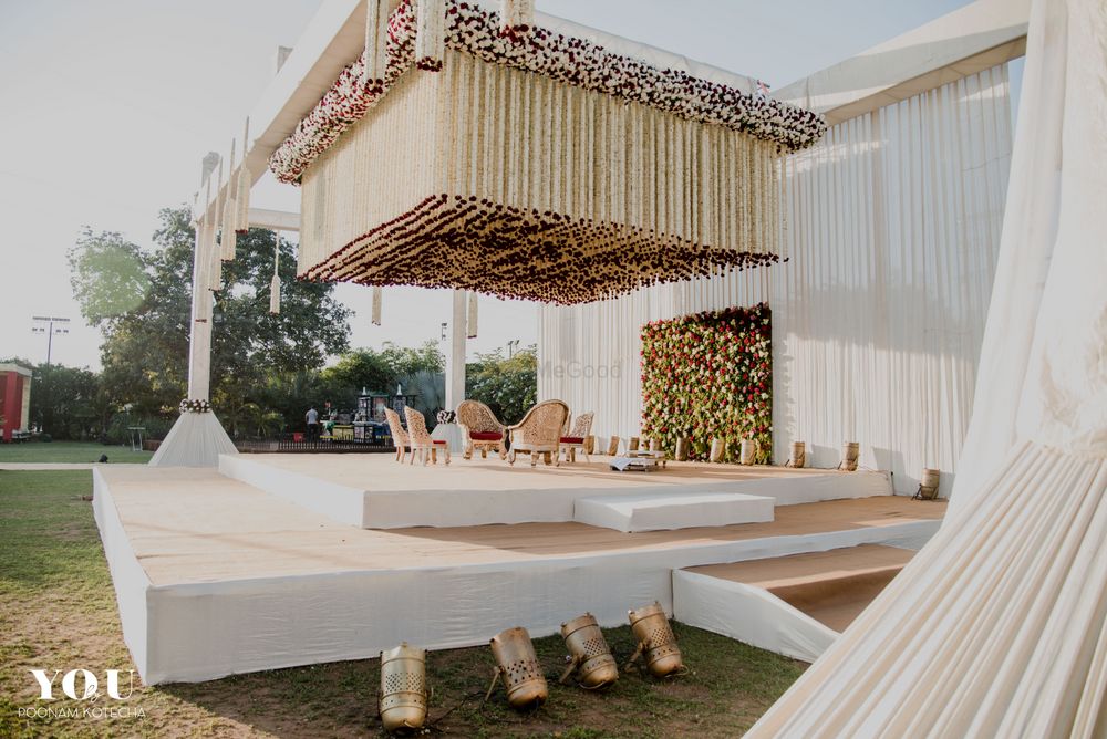 Photo of Mandap with floral strings and unique ceiling