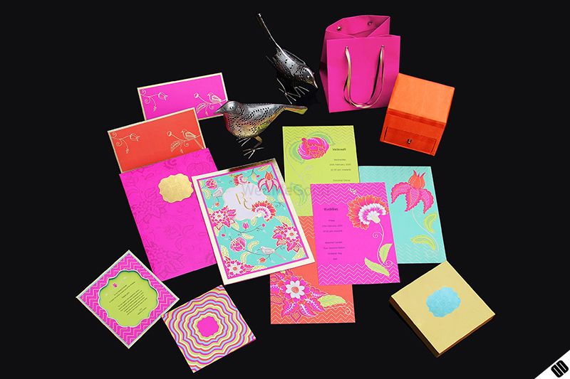 Photo of bright and colourful wedding invites