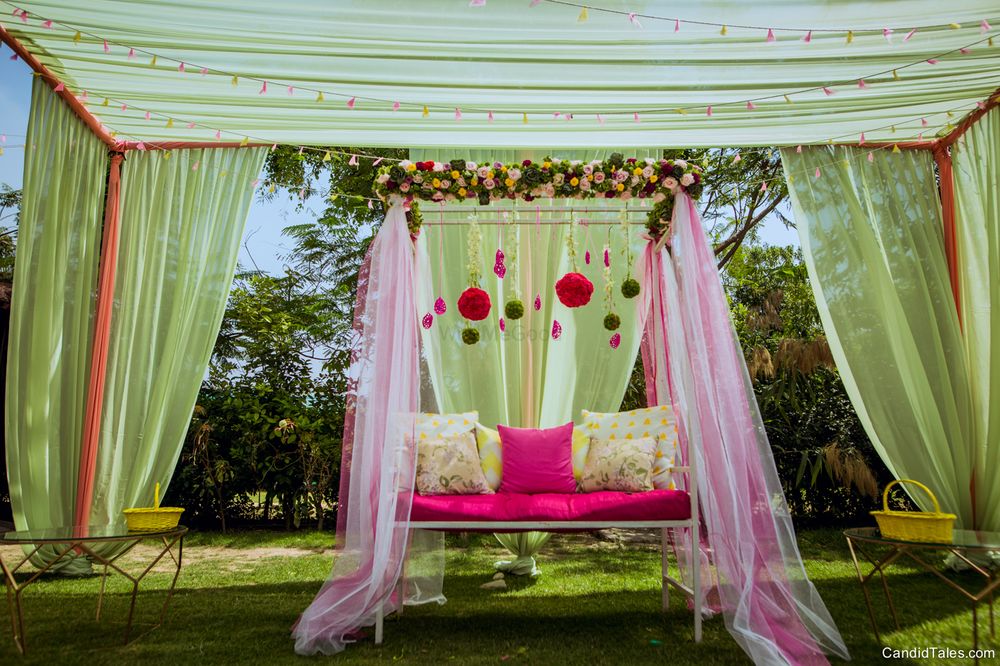Photo of Mehendi swing with green and pink decor