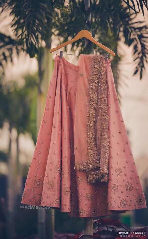 Photo of Blush pink engagement lehenga on hanger