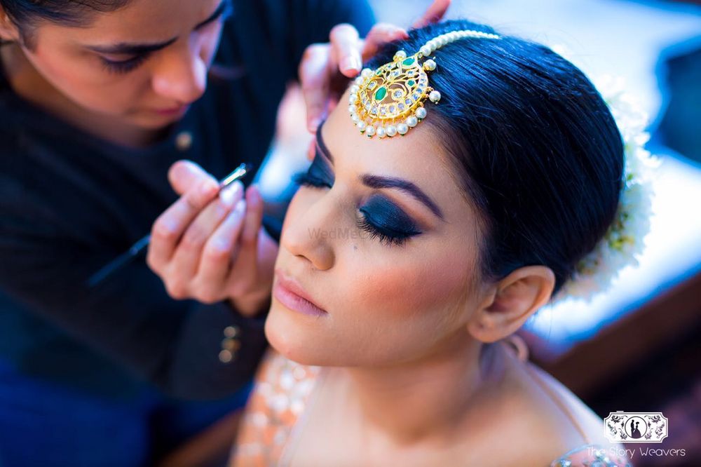 Photo of Ink blue smokey eyes makeup for bride