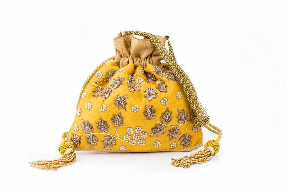 Photo of yellow bridal clutch
