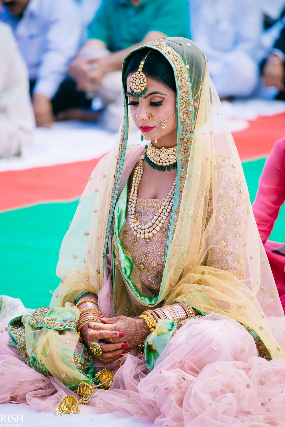 Photo of Sikh bride with light pink and blue lehenga