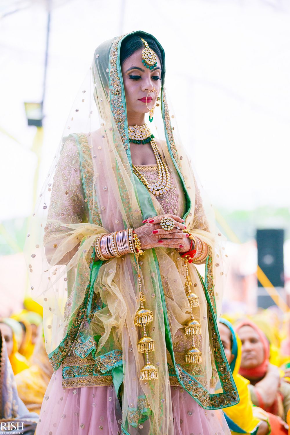 Photo of Unique bridal lehenga with light pink and blue
