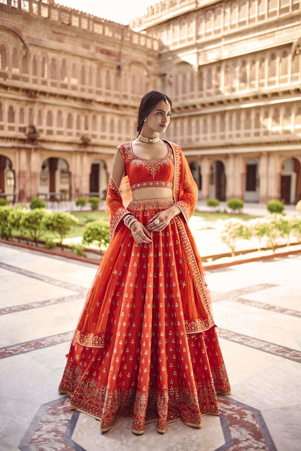 Photo of Red and orange simple bridal lehenga by Anita dongre