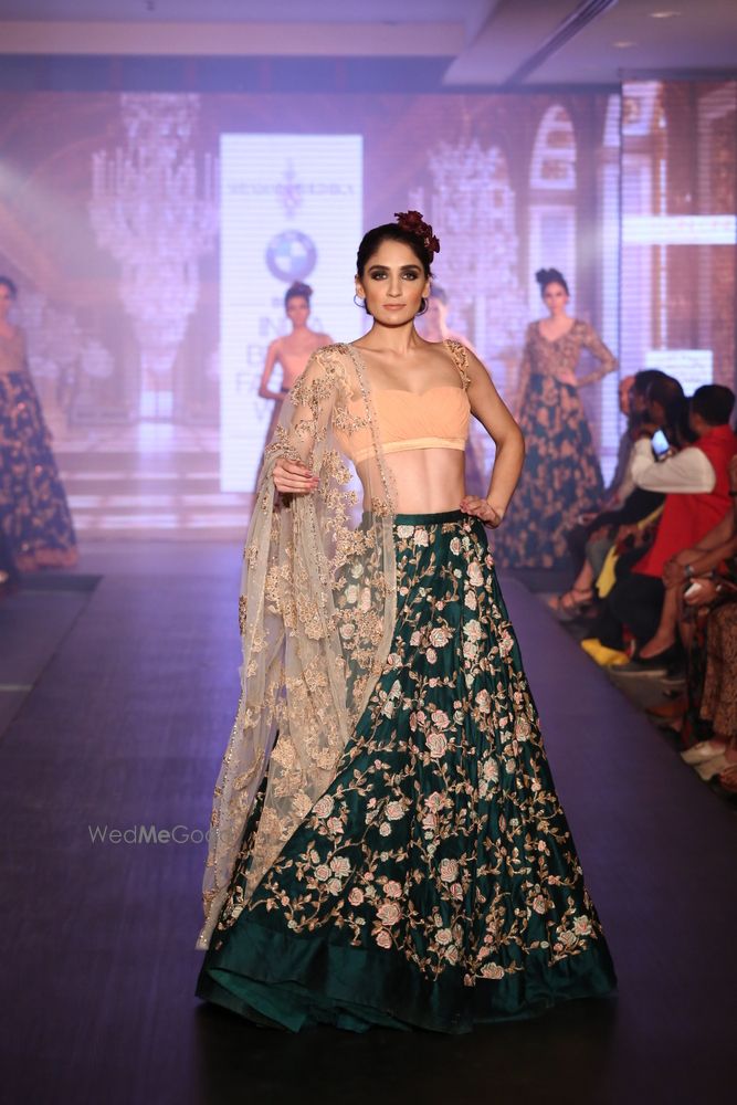 Photo of emerald green raw silk lehenga