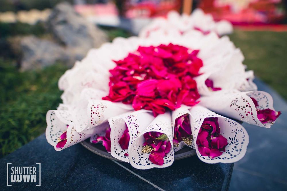 Photo of Rose petals for guests in paper cones