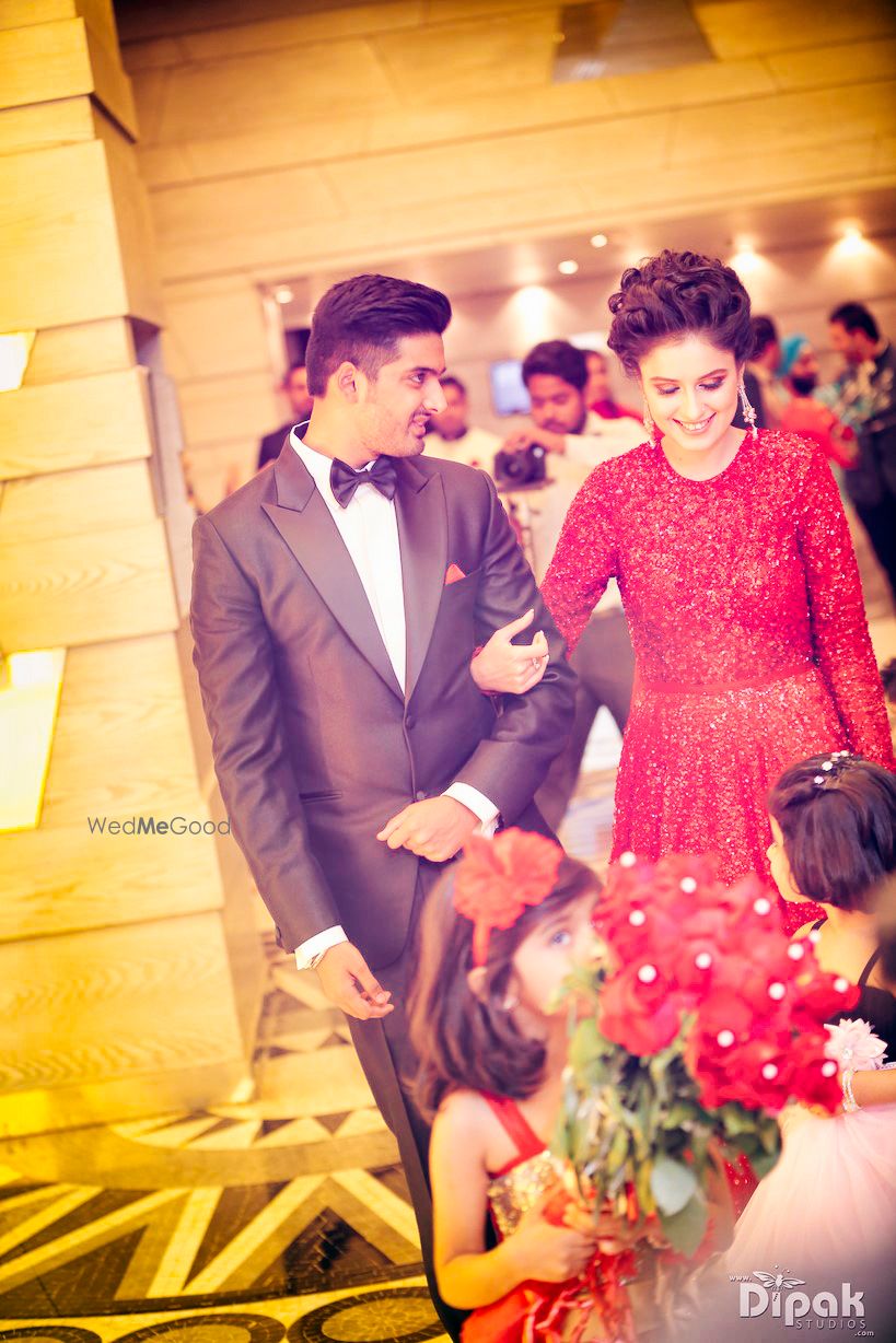 Photo of fully sequined red gown