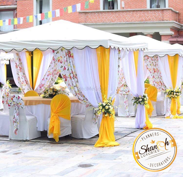 Photo of White yellow and floral pring canopy decor