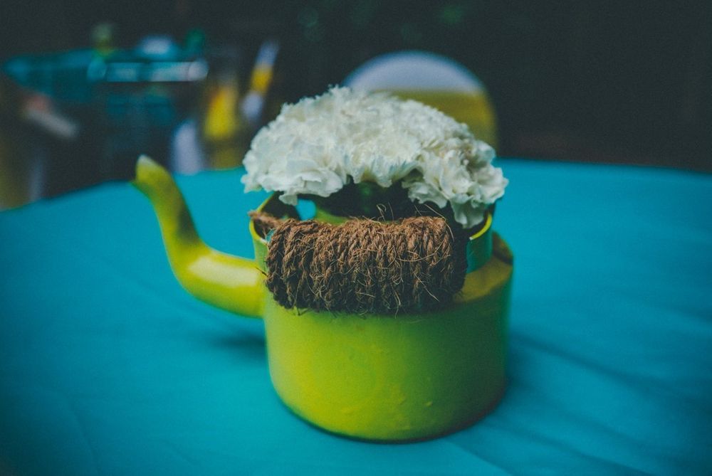 Photo of Kettle in decor with green one as centrepiece