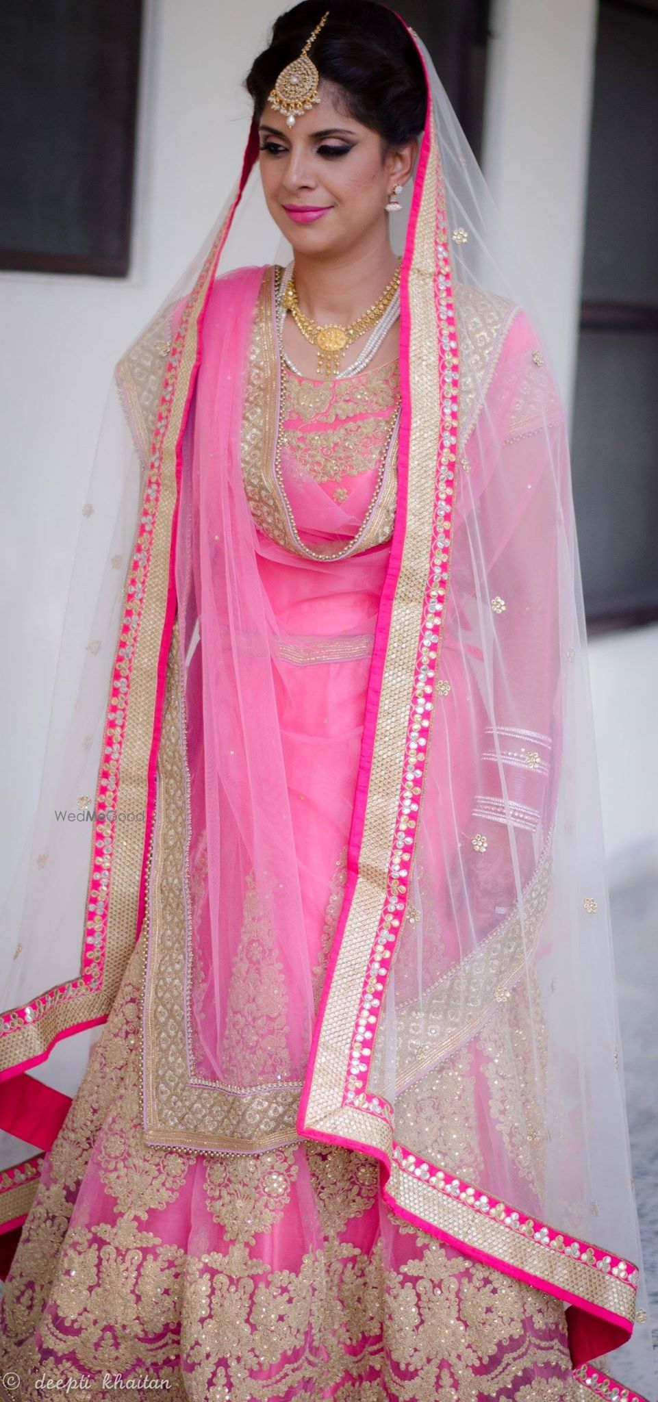 Photo of pink and gold lehenga