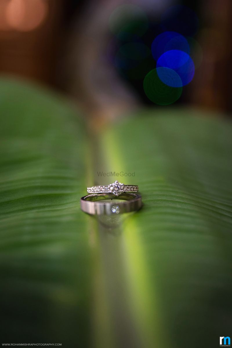 Photo of Engagement Couple Rings on a Leaf