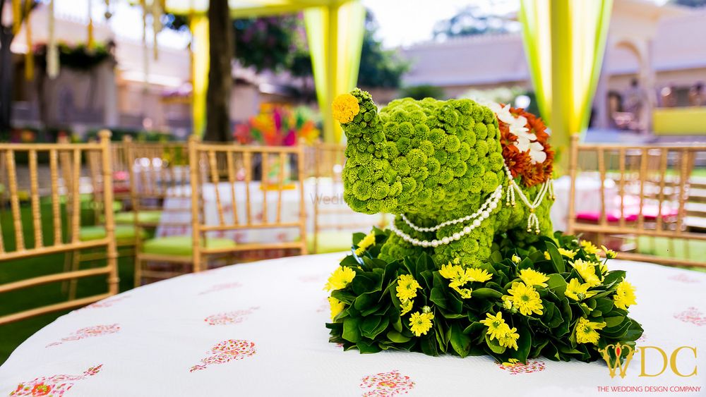 Photo of Unique floral mehendi table centerpiece