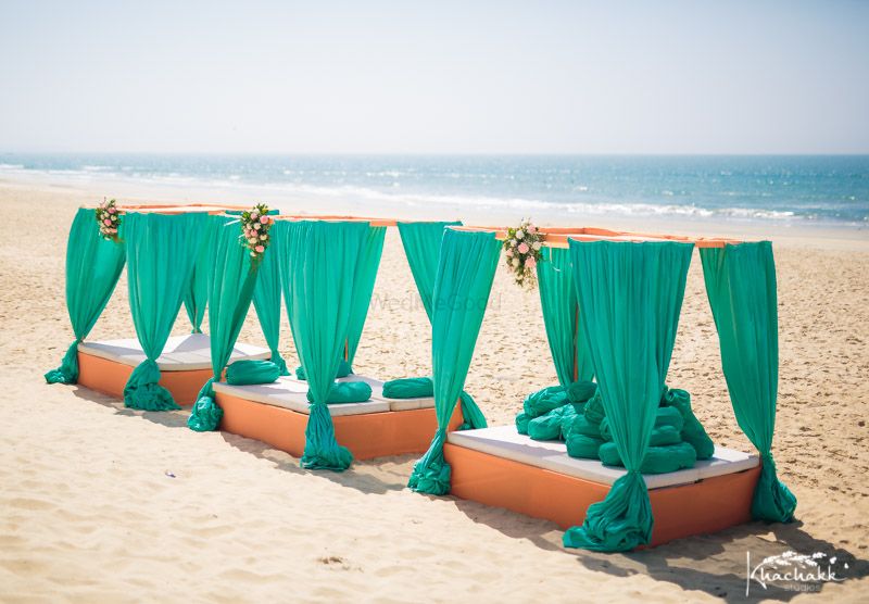 Photo of Beach wedding mandap decor with turquoise and peach