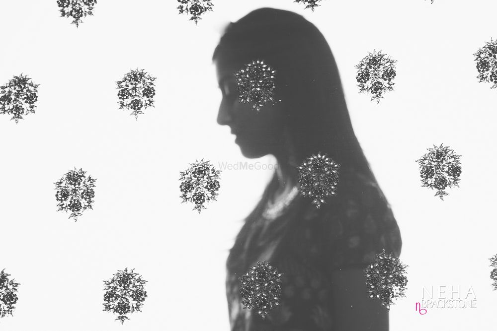 Photo of Black and white bridal portrait against dupatta
