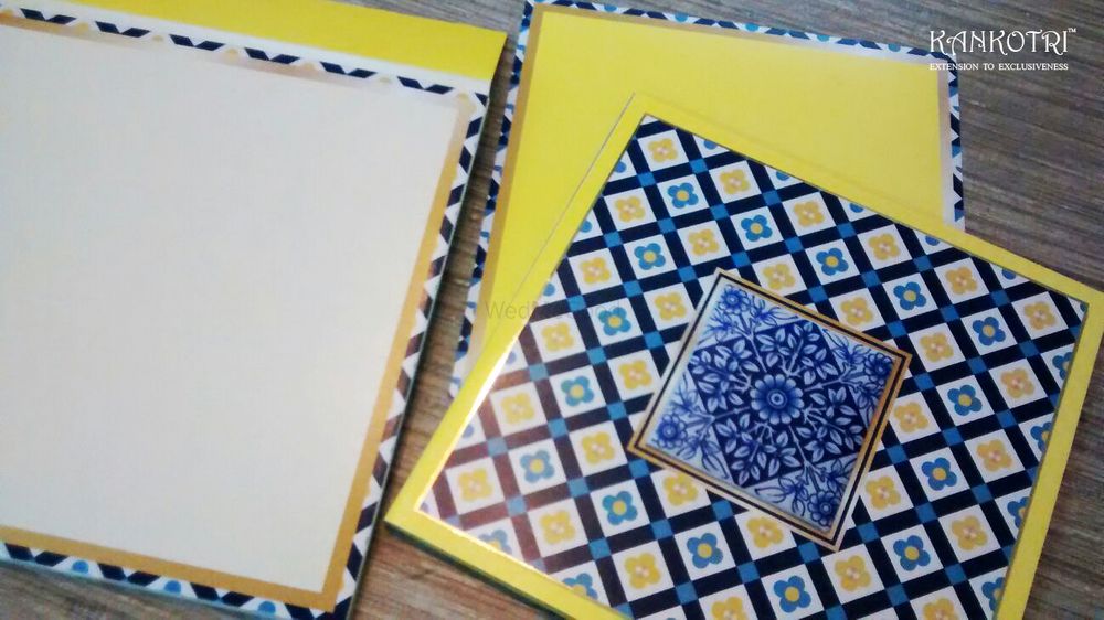 Photo of blue and yellow wedding card