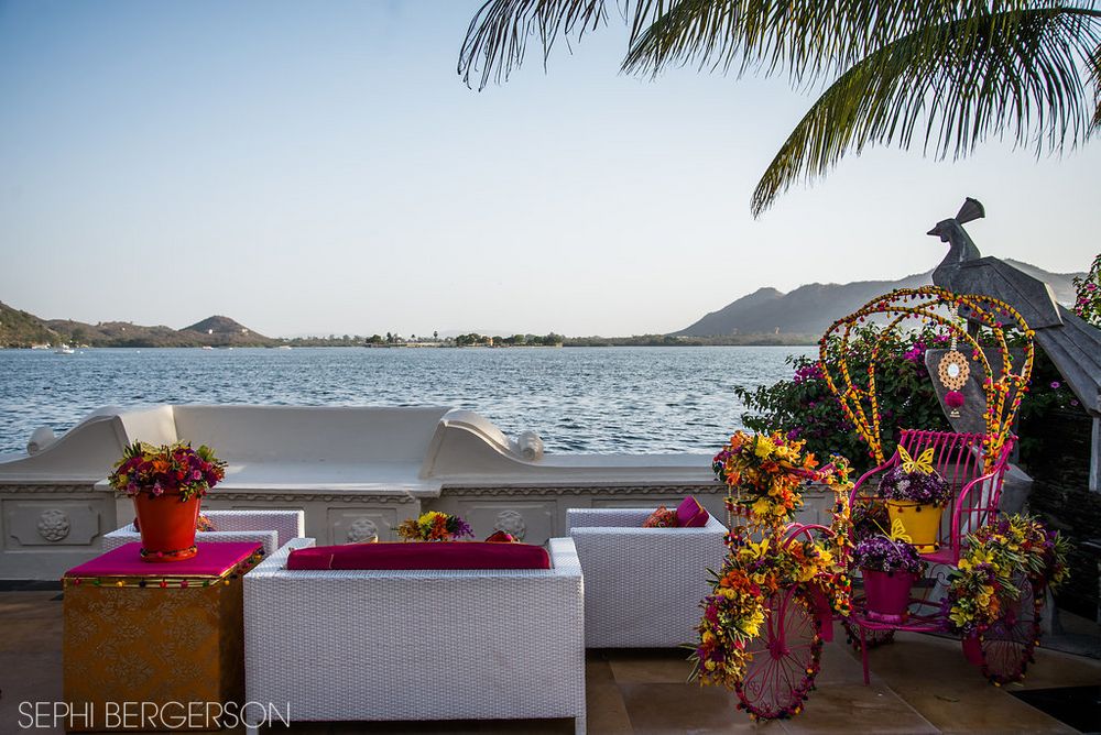 Photo of Pink rikshaw with florals photobooth