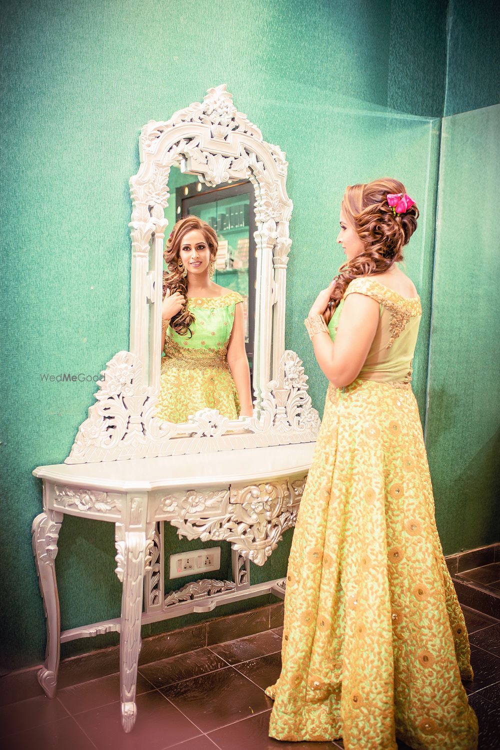 Photo of Bride to be posing in the mirror shot