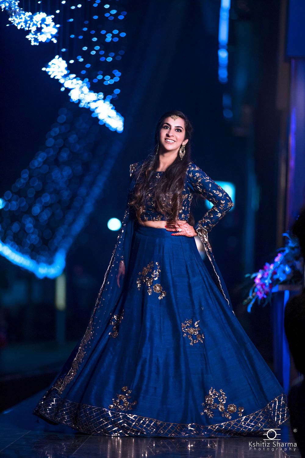 Photo of Beautiful indigo blue and gold lehenga for a pre wedding function