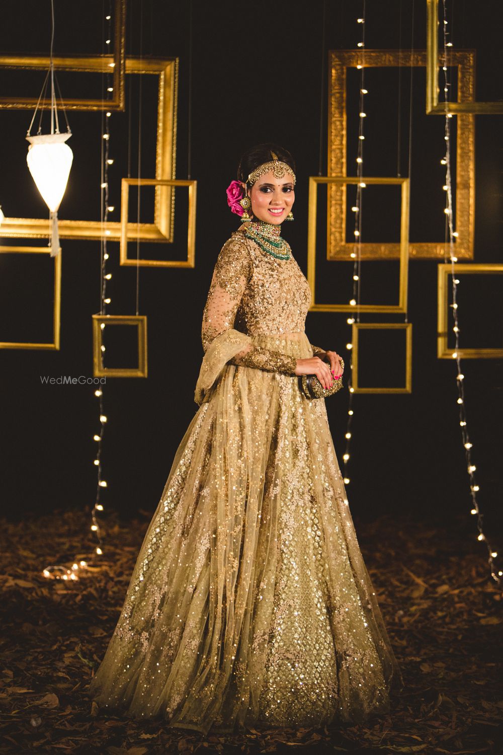 Photo of fully sequinned gold lehenga and jacket